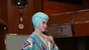 Terry Putri tampil cantik mengenakan busana rancangan Anniesa Hasibuan, seorang desainer busana muslim. Kini tren hijab tak hanya menyebar di negara Indonesia maupun negara Timur Tengah saja. (Nurwahyunan/Bintang.com)