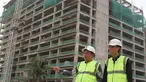 Project Dir. LRT City Jaticempaka-Gateway Park, Ibnu Mahmud Junaidi dan Manager Pemasaran PT Adhi Commuter Properti Djoko Santoso berbincang pada acara Topping Off Tower Accordeon LRT City Jaticempaka Gateway Park di Bekasi, Sabtu (17/11). (Liputan6.com)