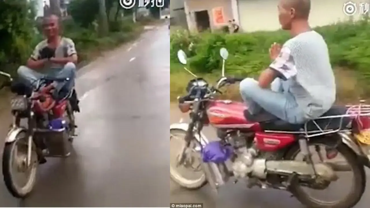 Heboh, Pria Ini Mengendarai Motor Sambil Bermeditasi