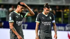 Pemain AC Milan tak mampu menutupi kekcewaan setelah dipaksa menyerah tim promosi Parma pada laga pekan kedua Serie A 2024/2025, Sabtu (24/8/2025). (AFP/Piero Cruciatti)
