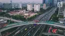 Foto udara pembangunan jalur kereta lintas rel terpadu (LRT) Jabodebek di Jakarta, Selasa (7/1/2020). Longspan Kuningan proyek LRT Jabodebek yang menjadi jembatan lengkung paling panjang di Indonesia memiliki panjang jembatan 148 meter dengan radius lengkungan 115 meter. (Liputan6.com/Faizal Fanani)