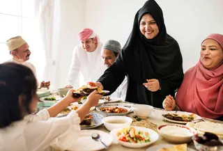 Berbuka Puasa/copyright Freepik.com https://www.freepik.com/free-photo/muslim-woman-sharing-food-ramadan-feast_3214241.htm#fromView=search&page=1&position=9&uuid=091f6bb6-619a-466d-8690-d84b04d873de&query=ramadan+fasting