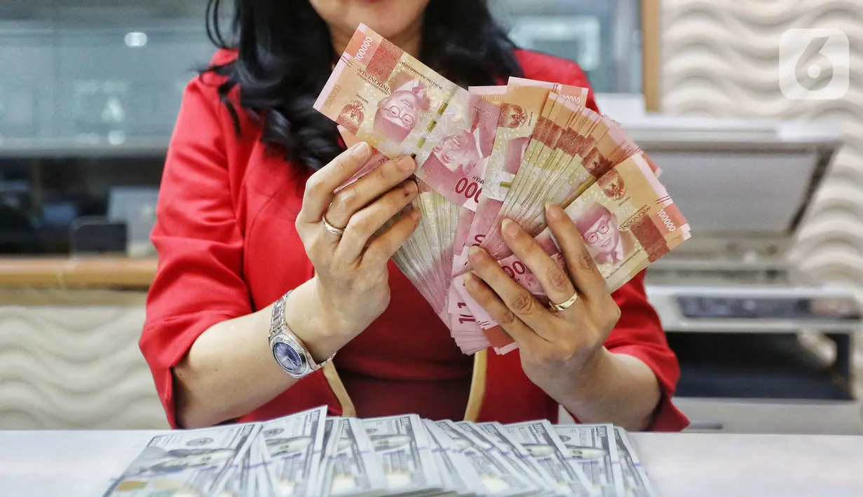 Seperti dilansir antaranews.com, analis pasar mata uang Lukman Leong mengatakan rupiah menguat terhadap dolar Amerika Serikat (AS) pascadata manufaktur Federal Reserve (Fed) Dallas melemah. (Liputan6.com/Angga Yuniar)
