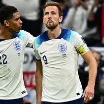 Jude Bellingham dan Harry Kane saat memperkuat Timnas Inggris. (AFP/Gabriel Bouys)