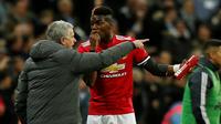 Hubungan manajer Manchester United, Jose Mourinho, dan Paul Pogba dikabarkan mulai renggang. (AFP/Ian Kington)