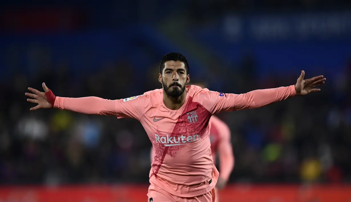 2. Luis Suarez (Barcelona) - 12 gol dan 4 assist (AFP/Oscar Del Pozo)