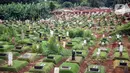 Deretan pemakaman khusus jenazah dengan protokol COVID-19 di TPU Pondok Ranggon, Jakarta Timur, Selasa (5/1/2021). Penanggung Jawab Pelaksana Pemakaman COVID-19 TPU Pondok Ranggon Muhaimin tengah berupaya mencari area baru yang memungkinkan untuk lahan pemakaman. (Liputan6.com/Faizal Fanani)