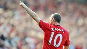 Aksi striker Manchester United, Wayne Rooney ketika berhadapan dengan Manchester City dalam lanjutan Liga Premier di Old Trafford, Manchester, 20 September 2009. AFP PHOTO/ANDREW YATES