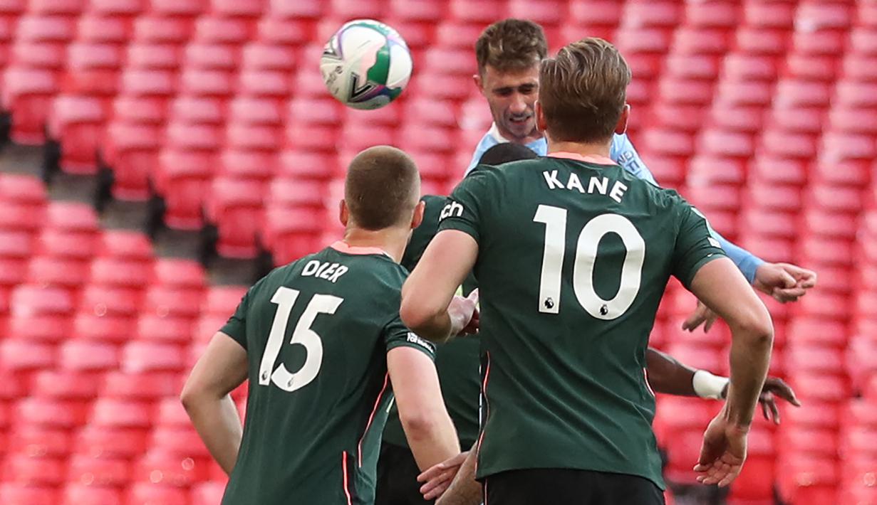 Tendangan bebas De Bruyne disambut Laporte dengan sundulan sempurna ke sudut bawah. Gol! Man City 1-0 Tottenham. (Foto: AFP/Pool/Carl Recine)
