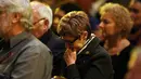 Misa tersebut dihadiri ratusan orang termasuk para anggota keluarga yang berduka, Australia, Kamis (7/8/14). (AFP PHOTO/POOL/Graham DENHOLM)