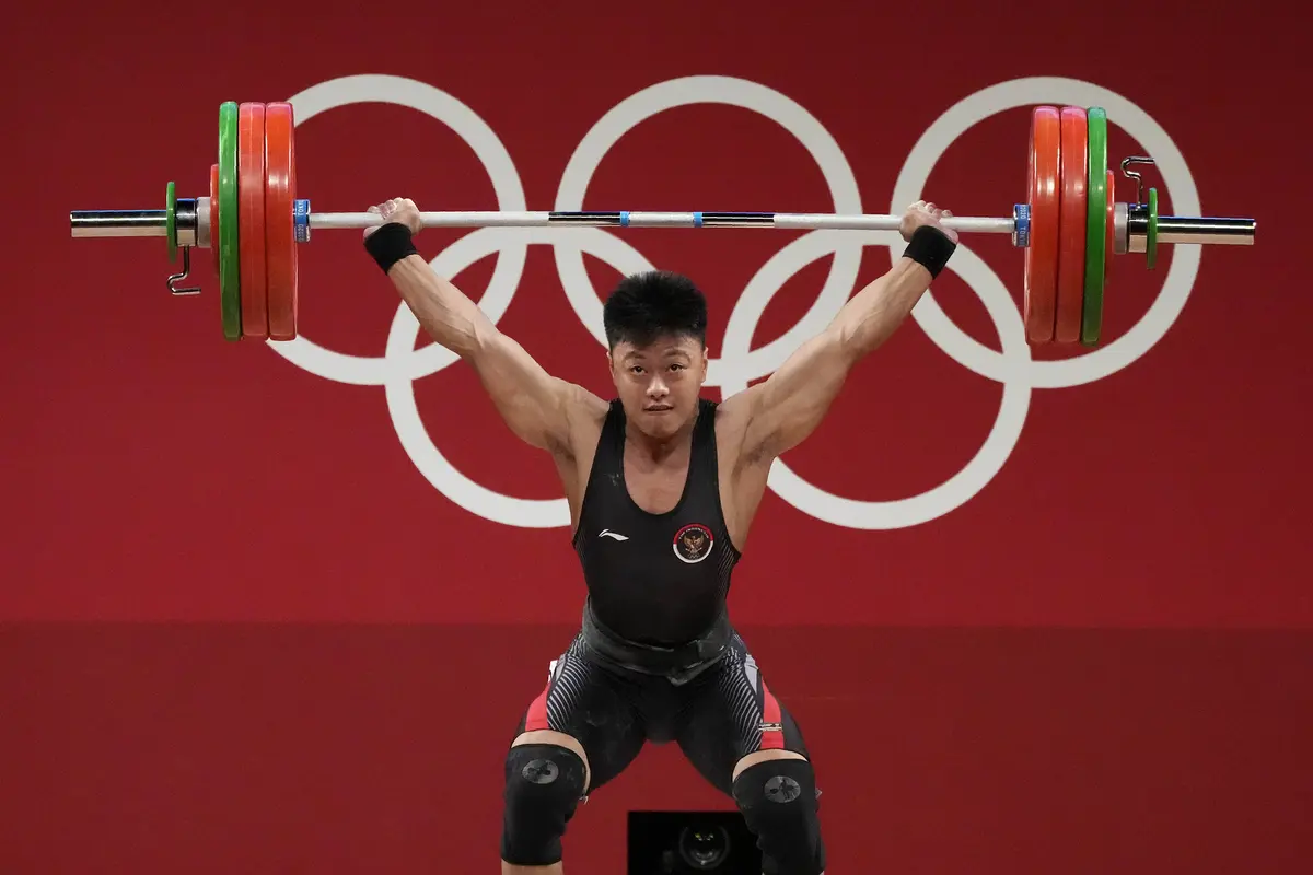 Foto: Rahmat Erwin Abdullah Sumbang Medali Perunggu dari Cabang Angkat Besi Kelas 73 Kg Putra Olimpiade Tokyo 2020