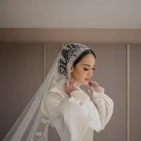 Gaun pengantin Ririn Ekawati yang vintage dan elegan rancangan desainer Hian Tjen (Instagram @hiantjen)