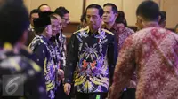 Presiden Joko Widodo atau Jokowi saat tiba dalam kerja nasional Badan Pengurus Pusat Himpunan Pengusaha Muda Indonesia (Rakernas BPP Hipmi) dan Peluncuran "Hipmi Go to School 2017 di Jakarta, Senin (27/3). (Liputan6.com/Angga Yuniar)