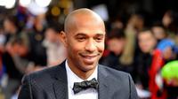 Kemenangan Arsenal atas Manchester United 3-0 di Emirates Stadium, Minggu (4/10/2015) malam WIB, disambut bahagia oleh Thierry Henry.