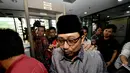 Waryono Karno memilih bungkam dan enggan berkomentar menanggapi pertanyaan wartawan di gedung KPK, Jakarta, Kamis (4/12/2014). (Liputan6.com/Miftahul Hayat)
