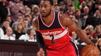 Guard Washington Wizards, John Wall, mencetak 14 poin dan 20 assist untuk membawa timnya mengalahkan Chicago Bulls dalam lanjutan NBA, Jumat (17/3/2017). (NBA.com)
