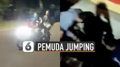 Beredar video dua orang pemuda sedang jumping motor di tengah jalan akhirnya nyemplung got.