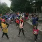 Drum Blek (drum band sampah) Panser Biru di Festival Tanjungsari, Semarang, Jawa Tengah. (Liputan6.com/Edhie Prayitno Ige)