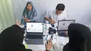 Layanan ini merupakan bentuk komitmen Kantor Imigrasi Kelas I Khusus Non TPI Tangerang dalam memberikan pelayanan publik yang cepat, mudah, dan humanis. (merdeka.com/Arie Basuki)