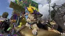 Seekor anjing didandani selama mengikuti Mystic Krewe parade anjing di New Orleans , Louisiana, (31/1). Kemeriahan juga ditambah dengan barisan orang - orang yang berasal dari komunitas tari. (REUTERS / Lee Celano)
