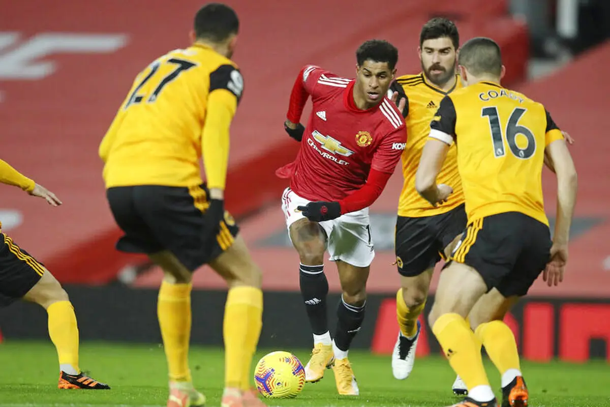 Foto Liga Inggris: Aksi Menawan Marcus Rashford Saat Menjadi Penentu Kemenangan Manchester United Atas Wolves
