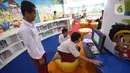 Aktivitas sejumlah siswa di ruang baca Perpustakaan Nasional (Perpusnas), Jakarta, Selasa (18/2/2020). Selain megah dan memiliki koleksi lengkap, Perpusnas juga menyediakan ruangan perpustakaan untuk anak-anak, layanan untuk penyandang disabilitas dan lansia. (Liputan6.com/Angga Yuniar)