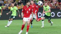 Reaksi bek Timnas Indonesia, Kevin Diks usai gagal mengeksekusi tendangan penalti saat menjalani laga melawan Australia di Allianz Stadium, Sydney dalam laga Kualifikasi Piala Dunia 2026, 20 Maret 2025 (AFP/David Gray)