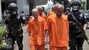 Tersangka dihadirkan dalam rilis peredaran Narkoba jaringan Internasional jaringan Tiongkok-Medan, di Gedung BNN, Jakarta, Selasa (7/3). Dalam penangkapan di 4 lokasi yang berbeda di Medan, petugas mengamankan 11 orang pelaku. (Liputan6.com/Yoppy Renato)