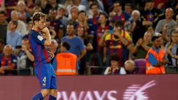 Ekspresi pemain Barcelona, Ivan Rakitic, setelah mencetak gol ke gawang Atletico Madrid dalam laga pekan kelima La Liga Spanyol musim ini yang berlangsung di Camp Nou, Kamis (22/9/2016) dini hari WIB. (Reuters/Albert Gea)