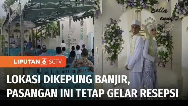 VIDEO: Sepasang Mempelai Tetap Gelar Resepsi Pernikahan Meski Dikepung Banjir