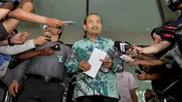 Menteri Andrinof memberikan keterangan pers usai lapor harta kekayaan ke KPK, Jakarta, Kamis (4/12/2014). (Liputan6.com/Miftahul Hayat)