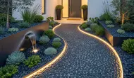 7 Desain Area Masuk Rumah dengan Jalur Batu Koral Hitam, Sentuhan Elegan dan Fungsional