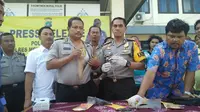 Anggota Polsek Metro Koja Aiptu Pardi Wiyanto saat berada di Mapolsek Metro Koja. (Liputan6.com/Moch Harun Syah)