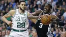 Pebasket San Antonio Spurs, Brandon Paul, menghindari penjagaan pebasket Boston Celtics, Abdel Nader, pada laga NBA di TD Garden, Boston, Senin (30/10/2017). Celtics menang 108-94 atas Spurs. (AP/Michael Dwyer)