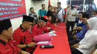 Walikota dan Wawako Palembang mengembalikan formulir pendaftaran bursa Pilkada 2018 ke PDI-Perjuangan (Liputan6.com / Nefri Inge)