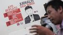 AJI mendesak agar pemerintah melakukan revisi terhadap UU ITE Nomor 11 Tahun 2008, khususnya dalam Pasal 27, yang menjadi pintu masuk kriminalisasi atas kebebasan berpendapat di internet, Jakarta, Selasa (23/12/2014). (Liputan6.com/Faizal Fanani)