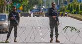 Tentara berjaga di pos pemeriksaan untuk memastikan keamanan menjelang kemungkinan negosiasi antara Amerika Serikat dan Iran di ibu kota Pakistan, Islamabad, Jumat 10 April 2026. Jelang pelaksanaan perundingan damai antara Amerika Serikat dan Iran, yang dijadwalkan berlangsung pada Jumat 10 April 2026, otoritas Pakistan memperketat keamanan di Islamabad. (AP Photo/Anjum Naveed)