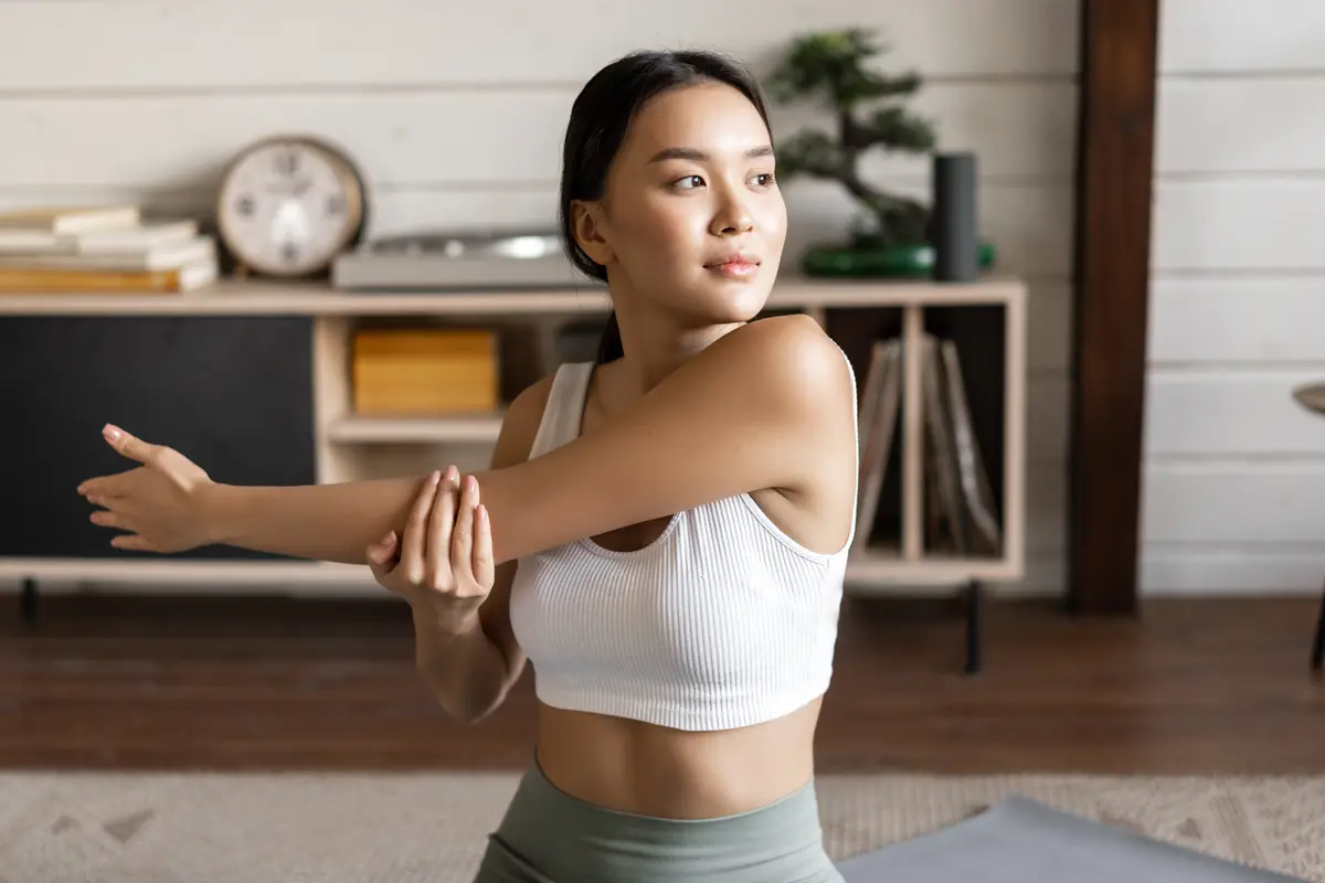 wanita november olahraga stretching