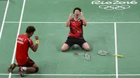Pasangan Indonesia, Tontowi Ahmad/Liliyana Natsir, berhasil melangkah ke final usai menaklukkan Zhang Nan/Zhao Yunlei pada Olimpiade 2016 di Rio de Janeiro, Brasil, Selasa (16/8/2016). (AFP/Jim Watson)