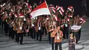 Kontingen Indonesia saat mengikuti parade di pembukaan SEA Games 2015, Singapura, Jumat (5/6/2015). (AFP Foto)