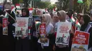 Massa AQSA Working Group (AWG) menggelar Aksi Jumat Nasional di depan Kedutaan Besar Amerika Serikat di Jakarta, Jumat, 21 Agustus 2026,. (KLY/ Arie Basuki)