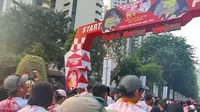 PDI Perjuangan menggelar lomba lari maraton bertajuk 'Soekarno Run' dalam rangka memperingati HUT ke-79 RI, Minggu (18/8/2024). (Liputan6.com/Ady Anugrahadi)