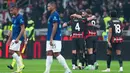 Pemain AC Milan merayakan kemenangan atas Inter Milan pada lanjutan Liga Italia 2025/2026 di Stadion Giuseppe Meazza, Senin (9/3/2026) dini hari WIB. (AP Photo/Antonio Calanni)