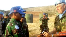 Citizen6, Lebanon Selatan: Prajurit TNI yang tergabung dalam Satgas Batalyon Mekanis Kontingen Garuda XXIII-F/UNIFIL (Indobatt) di Lebanon menempati urutan kedua pada pertandingan menembak tingkat UNIFIL, Minggu (27/5). (Pengirim: Badarudin Bakri)