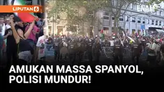 Final etape Vuelta a España 2025 ricuh setelah demonstran pro-Palestina memblokade rute balapan di Madrid, Minggu (14/9). Massa melempar barikade ke jalan dan membawa spanduk anti-Israel, memaksa para pebalap berhenti sebelum garis finis.