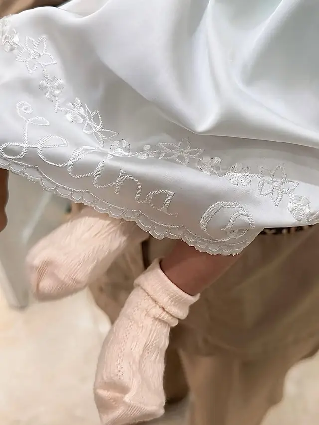 Dress Selina Putri Mahalini dan Rizky Febian saat Aqiqah. [@nindypricilia]