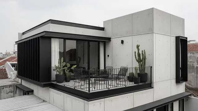 Model Rumah Minimalis dengan Atap Datar dan Rooftop Kecil
