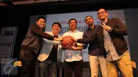 Menpora Imam Nahrawi (tengah) saat menghadiri acara peresmian kerja sama KMK Online dengan NBA di XX1 Lounge Plaza Senayan, Rabu (3/5). Konten-kontek ekslusif NBA termasuk siaran langsung akan bisa dinikmati secara gratis. (Liputan6.com/Gempur M Surya)