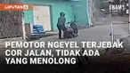 Insiden berikut ini perlu menjadi perhatian bagi pengendara. Seorang pemotor terjebak di jalan cor akibat aksi nekatnya. Ia menerobos cor jalan yang masih basah meski sudah diperingatkan warga. Peristiwa disebut terjadi di Kampung Panyairan, Parongpo...