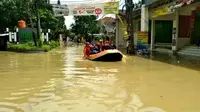 Kondisi di Perumahan Villa Nusa Indah 1 dan 2 Desa Bojongkulur, Kecamatan   Gunungputri, Kabupaten Bogor yang kembali terendam banjir, Senin (8/2/2021) pagi. (Liputan6.com/Achmad Sudarno)